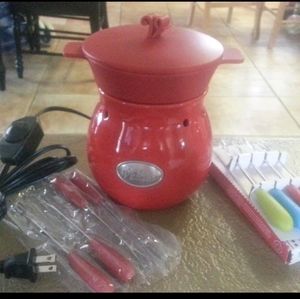 Electric fondue warmer.  New in box